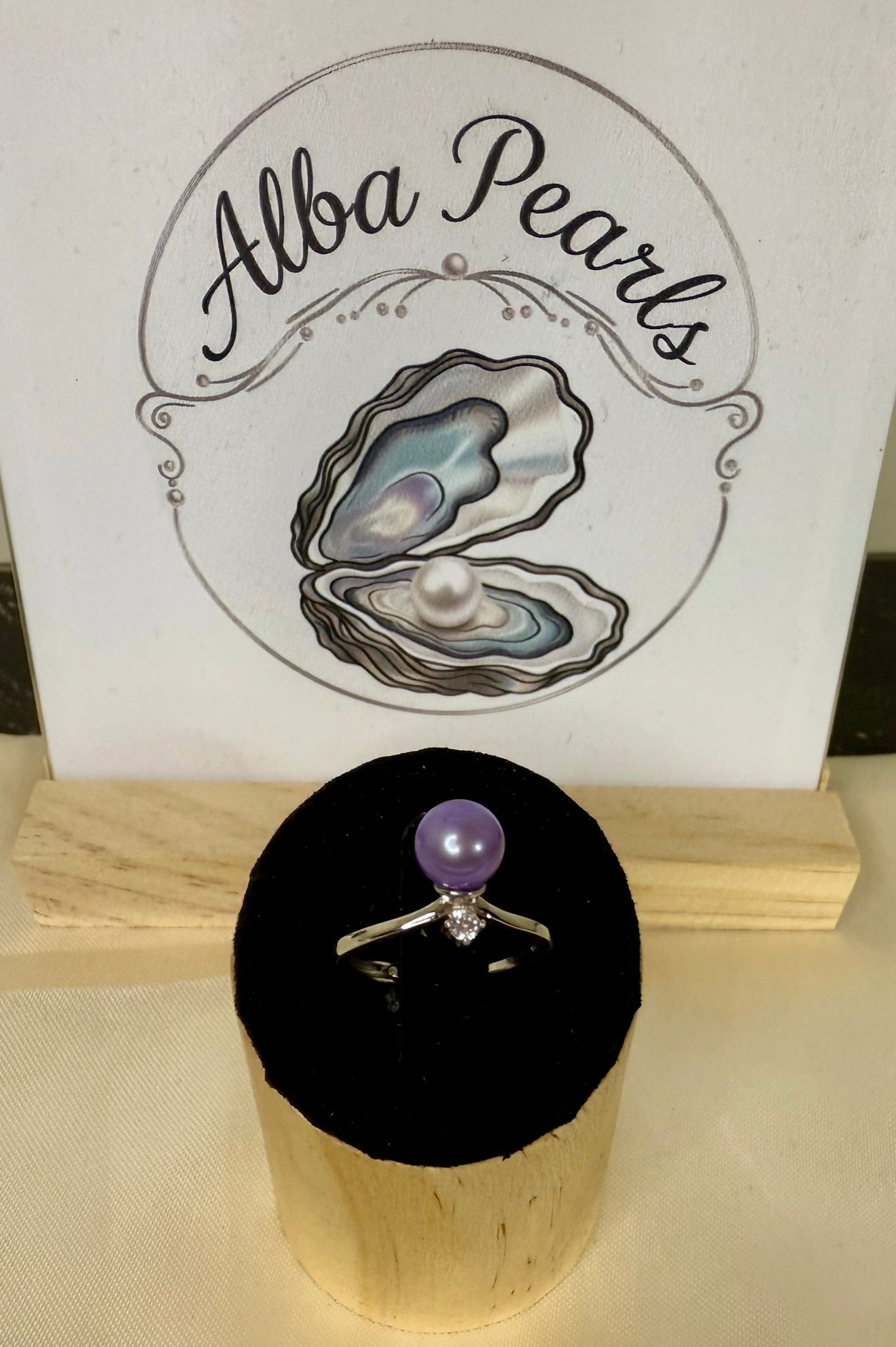 Simple Ring with cubic Zirconia Drop - Purple Pearl