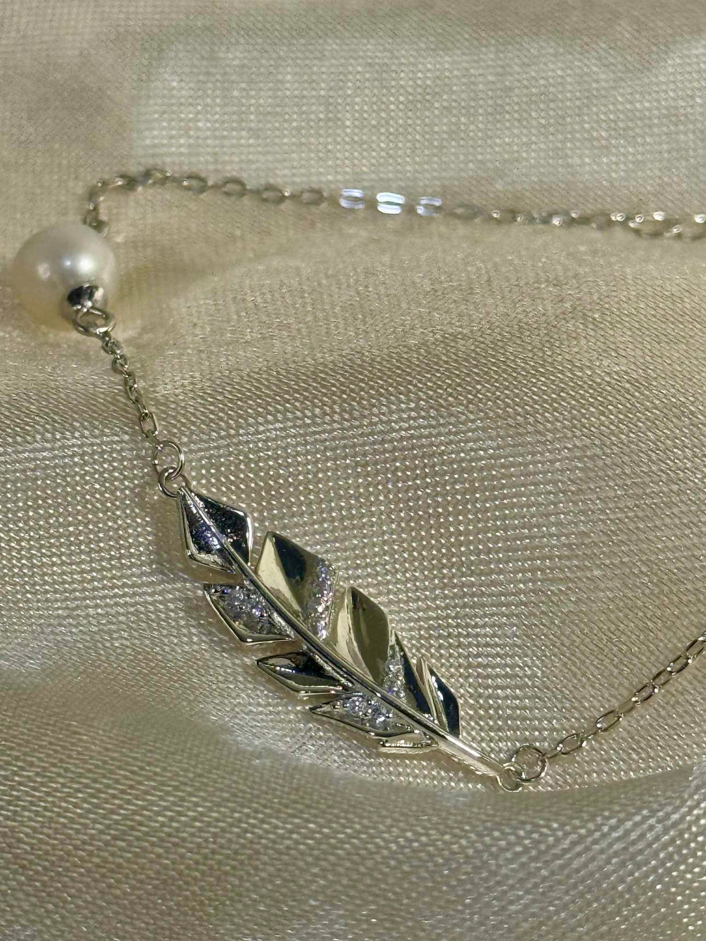 Feather Bracelet - Includes single oyster opening
