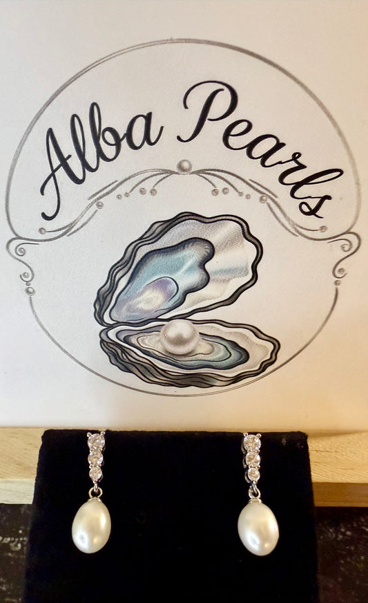 Natural Freshwater Pearl Earrings- Includes twin Oyster Opening