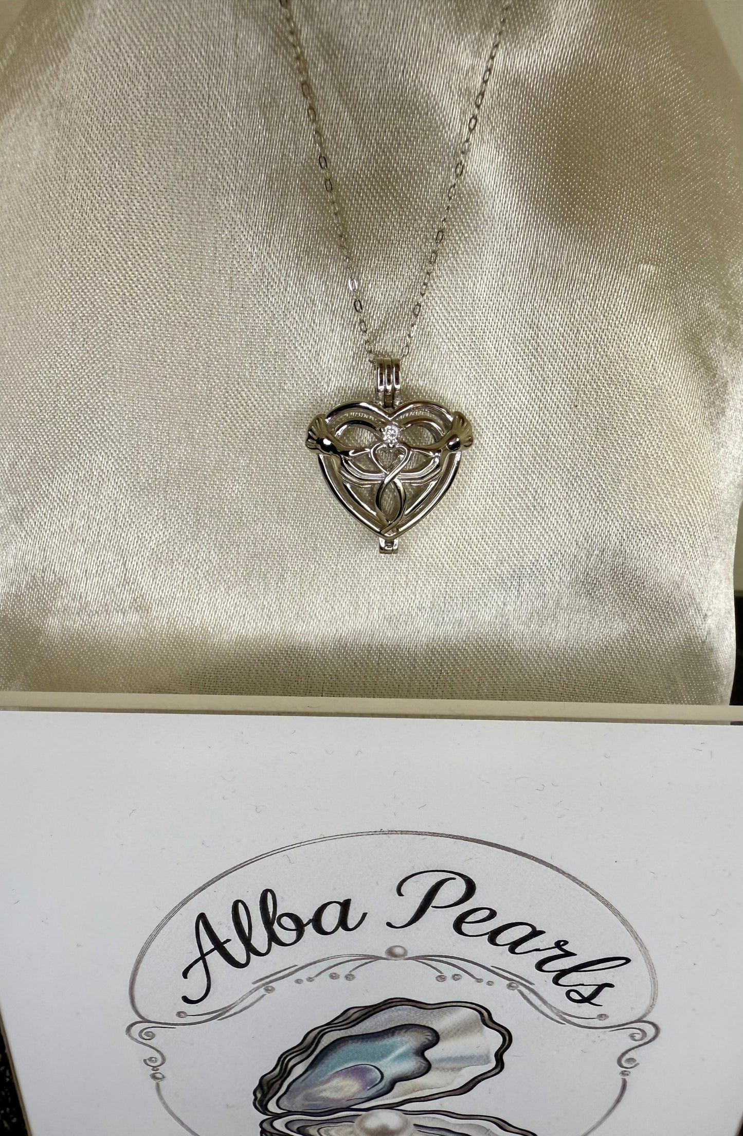 Claddagh Cage Pendant - Includes single oyster opening