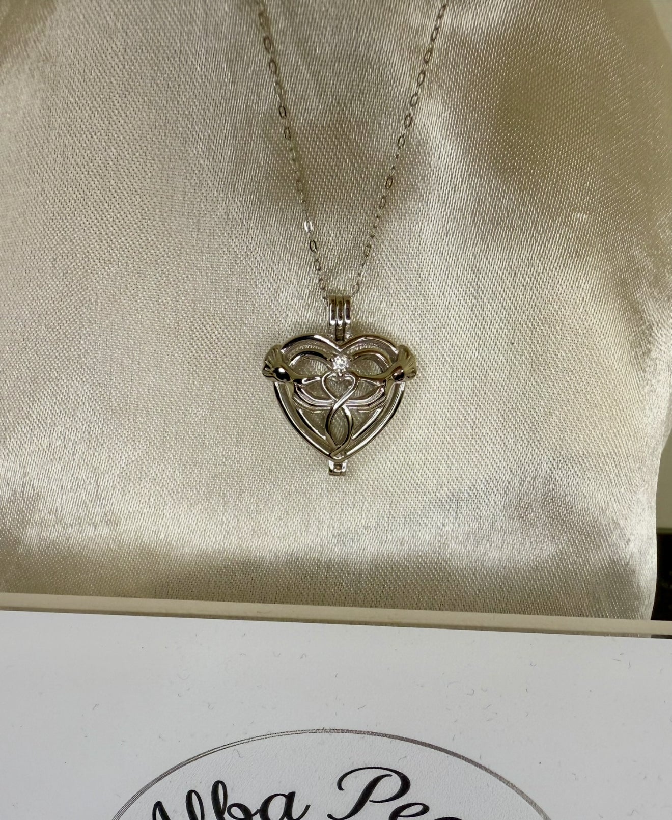 Claddagh Cage Pendant - Includes single oyster opening